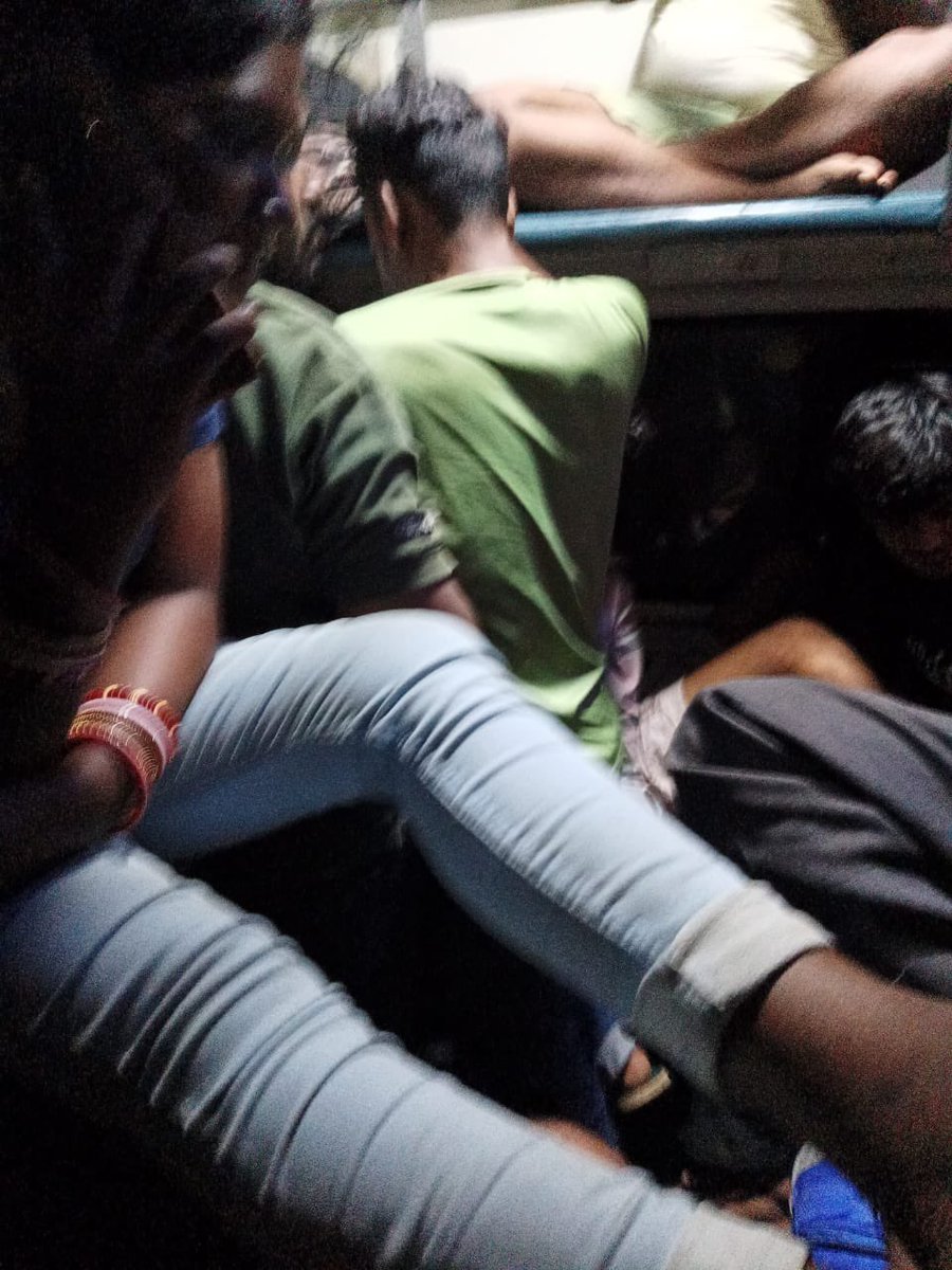sunilchode's tweet image. I am Rajasekhar a reserved passenger traveling on Train No. 15228 (MFP-Yesvantpur Express) in Sleeper Class with PNR 6254793660.

The compartment is extremely overcrowded with unreserved passengers occupying all available space, including the floor and reserved berths.
