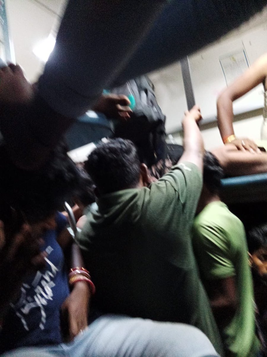 sunilchode's tweet image. I am Rajasekhar a reserved passenger traveling on Train No. 15228 (MFP-Yesvantpur Express) in Sleeper Class with PNR 6254793660.

The compartment is extremely overcrowded with unreserved passengers occupying all available space, including the floor and reserved berths.