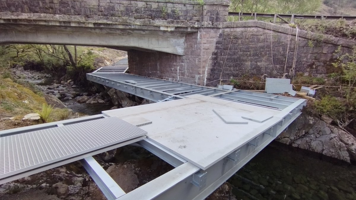 SmithyScotland's tweet photo. Photos for an Open Street Map note on new bridge in Glen Coe.  It's a bridge under a bridge or is it a footpath through a tunnel?  
Way: 1393185122 | OpenStreetMap https://t.co/8HOxSBEbgt