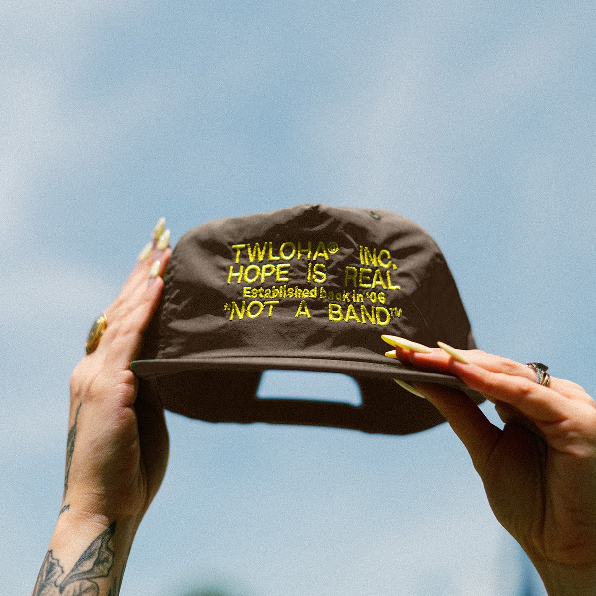 TWLOHA's tweet image. “Wait, is this a band?”
Since 2006, we’ve been disrupting the stigma around mental health at music festivals, but not on stage—though people still stop by our booth to say they love our music (spoiler: we don’t have any). So while we’re still not a band, we will always be proud…