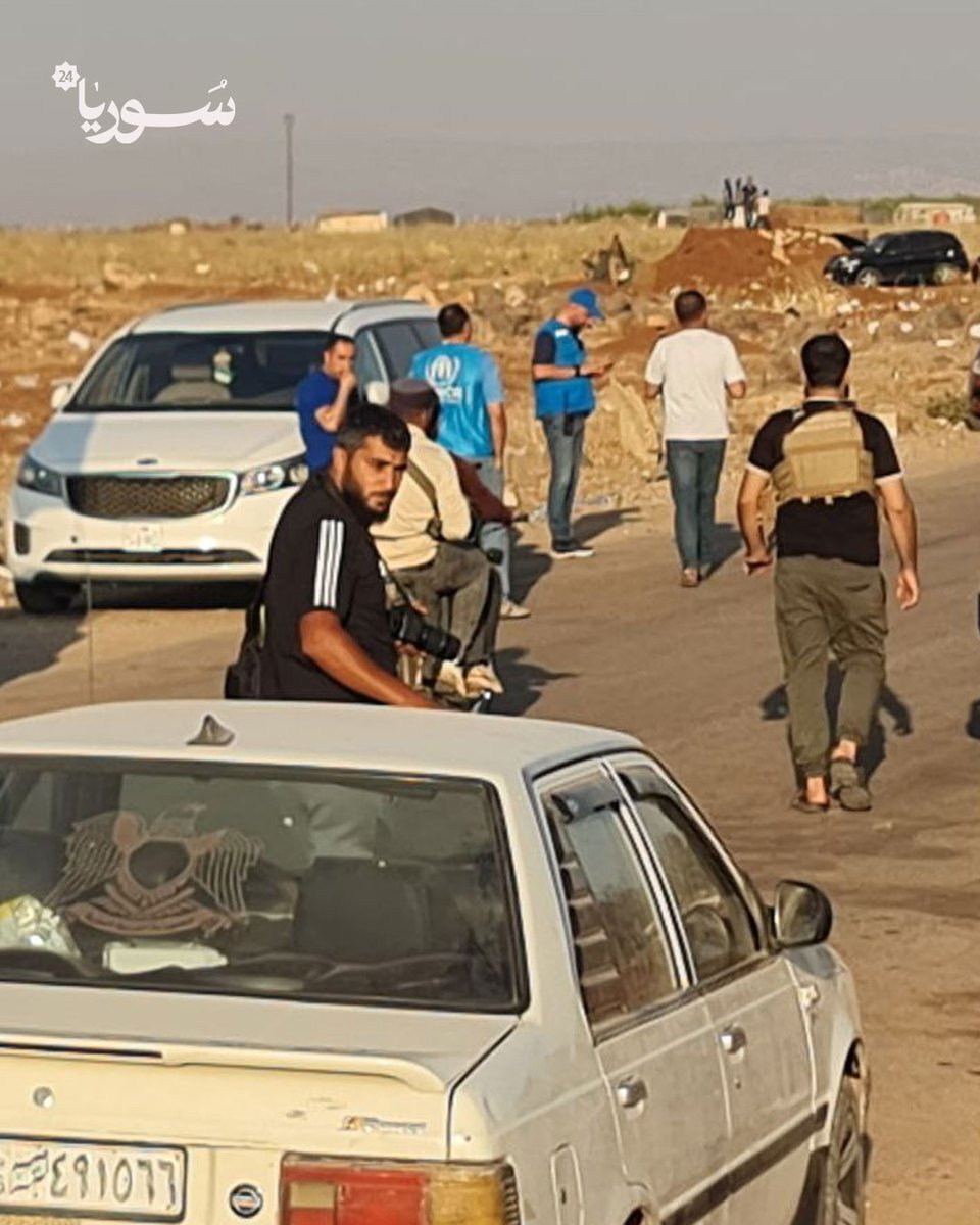 SY_plus's tweet image. مراسل سوريا 24: حافلات إخلاء برفقة سيارات الأمم المتحدة تدخل إلى السويداء لإخراج عائلات من المدينة.