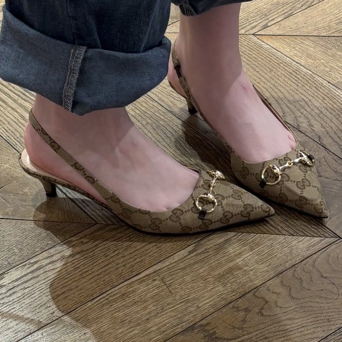 lamblecter's tweet image. i refuse to fall for designer brand propaganda HOWEVER i tried on these gucci heels today for funsies and they are sooo pretty. the price tag was not as pretty ($1400)