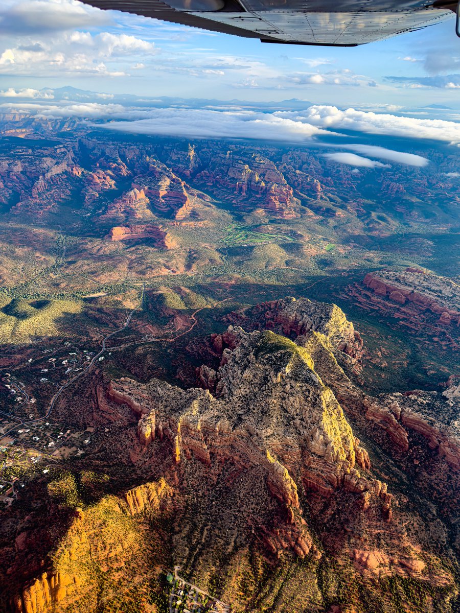 TonyReinke's tweet image. Morning coffee over Sedona and Meteor Crater as pilot-son’s passenger number one. Amazing pilot! Amazing region!