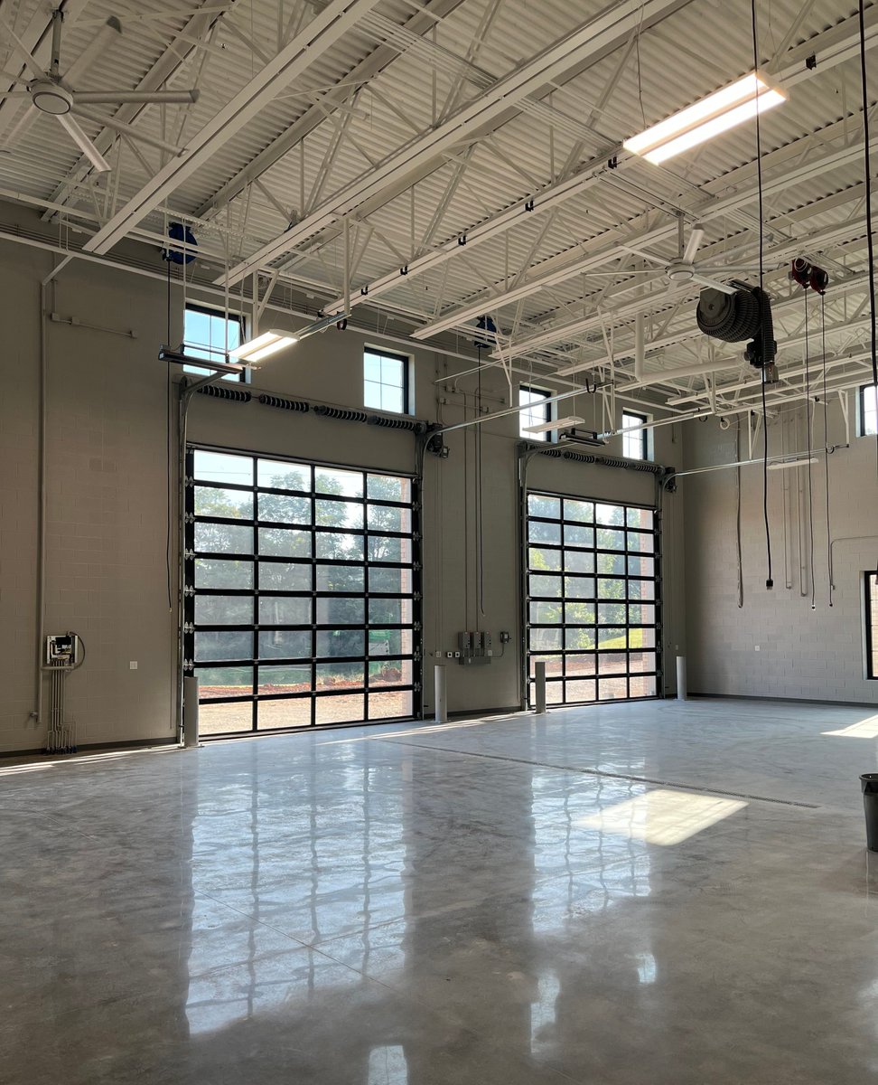 midstate_const's tweet image. A Look Inside! Check out the new overhead doors installed in the diesel mechanics bays at the TCAT project site. These bays are designed to provide students with a top-notch space for hands-on training and education.
#MidStateConstruction #TCAT