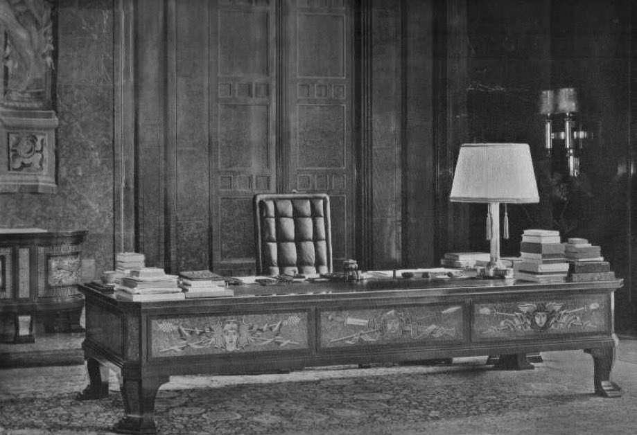 EsotericSaxon's tweet image. Adolf Hitlers desk in the Reich Chancellery. The three panels are of Athena, Ares and Medusa