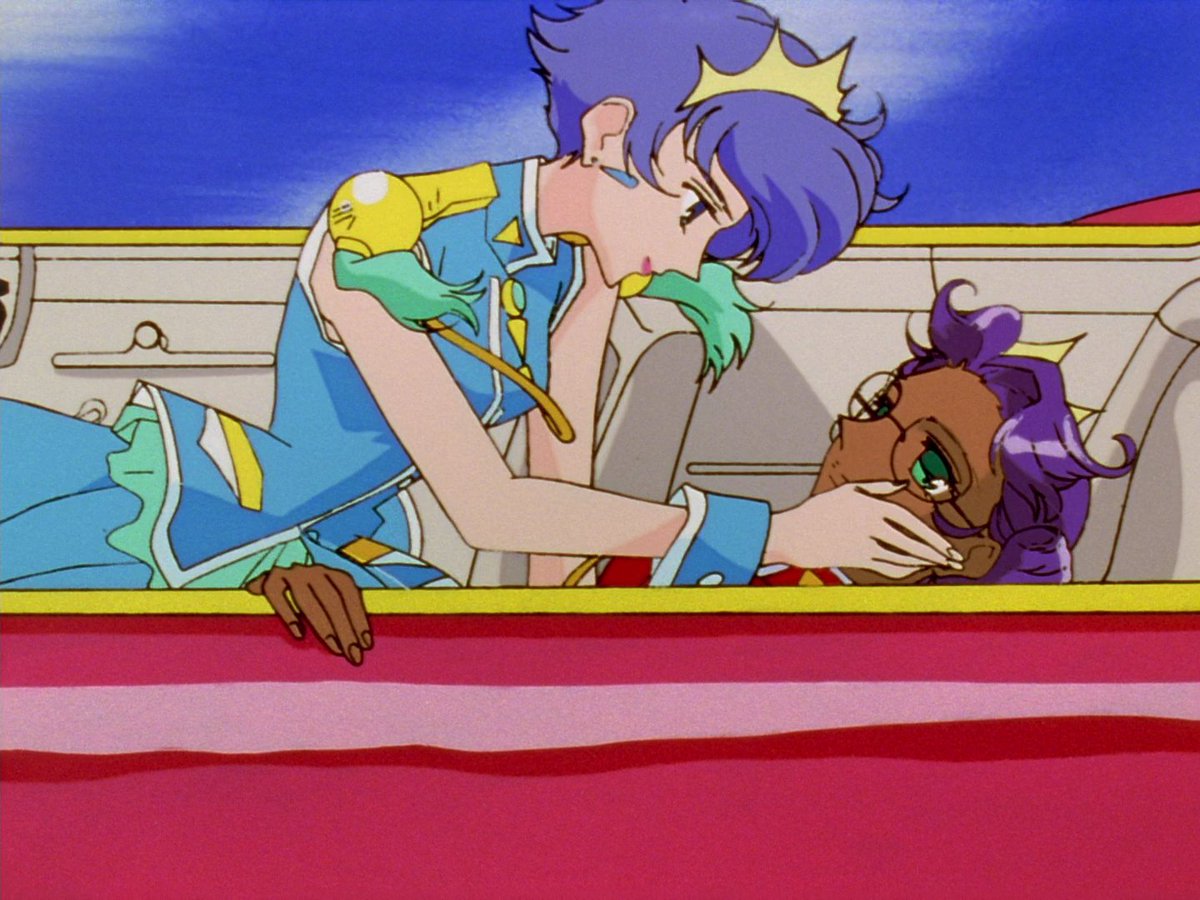 anthy initially had her hands clasped on her lap, but as kozue got on top of her, her left hand gripped the car door