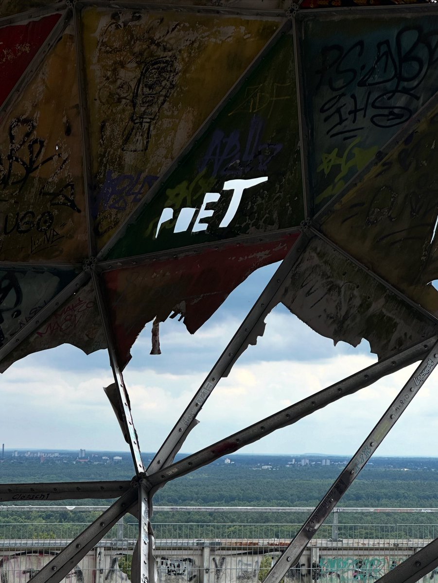 Carved out of graffiti’d metal and letting the sky through—poets are everywhere if you look for them.