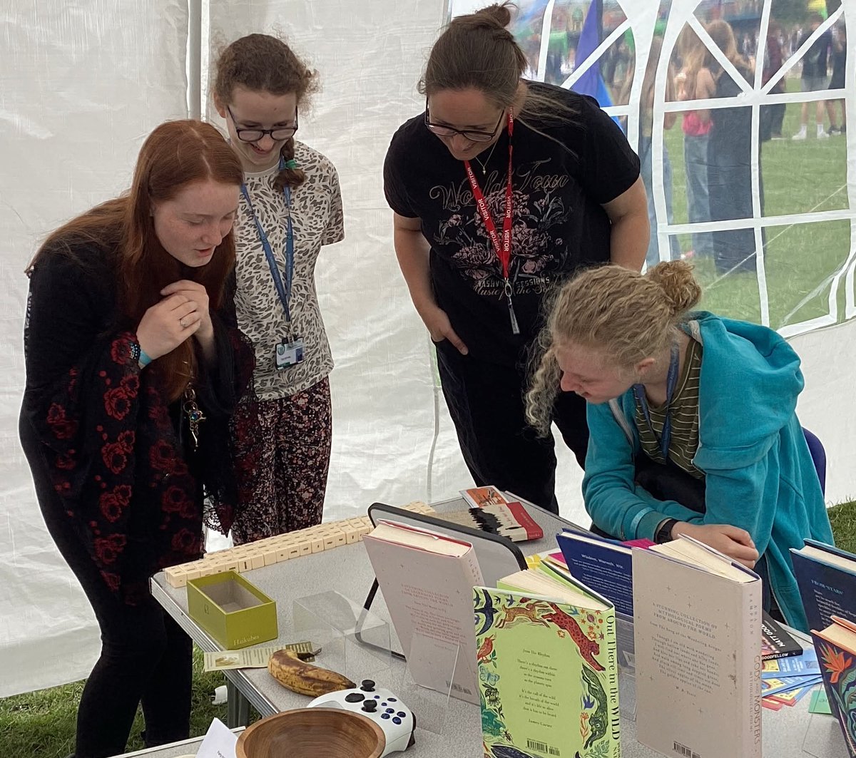 AttieLime's tweet image. Today&apos;s secondary school visit had a ferris wheel, dodgems, and an ice-cream van (right next to my spot 👍🏻)! Lots of wordy fun and bookish chat in the poetry tent. Loved it!