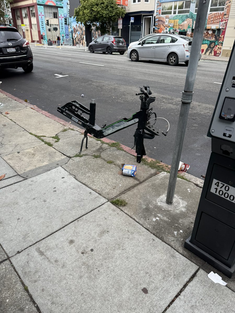 rdlickman's tweet image. What’s left of a stolen @baywheels bike on Howard between Russ and Harriet