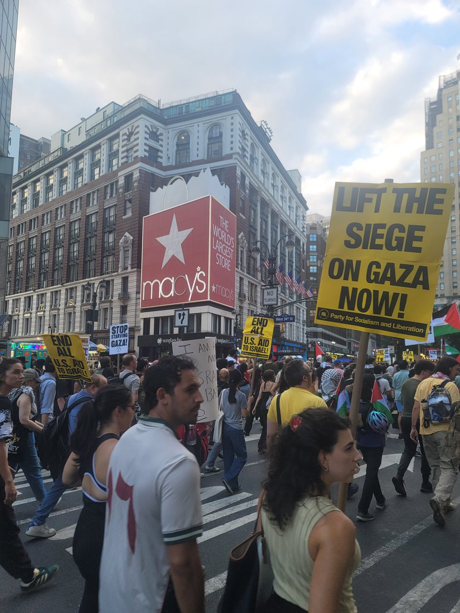patrickdehahn's tweet image. Chants of "shut it down" by pro-Palestine protesters approaching Herald Square in New York's Manhattan borough.
Marchers are holding signs reading "lift the siege on Gaza now!" and "stop starving Gaza now!"