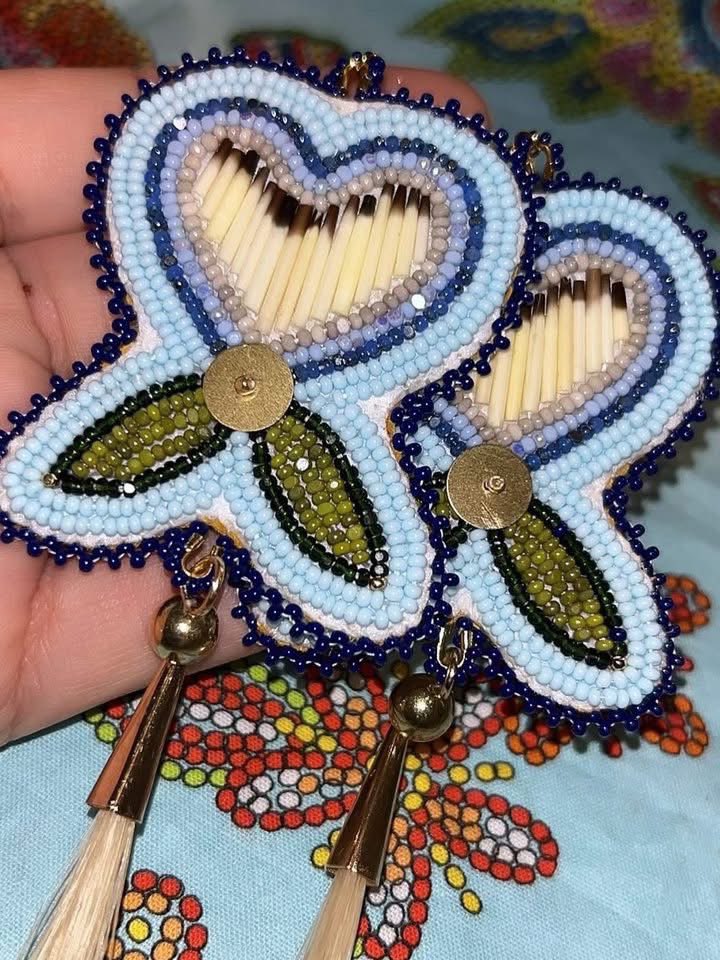 denefootghoul's tweet image. Hello everyone! I have this pair of beaded earrings made by me available.
I made these with quills, brass sequin centres and horse hair drops. The main design is charlotte cut beads but the border and edges are regular seed beads
$90 CAD + Shipping