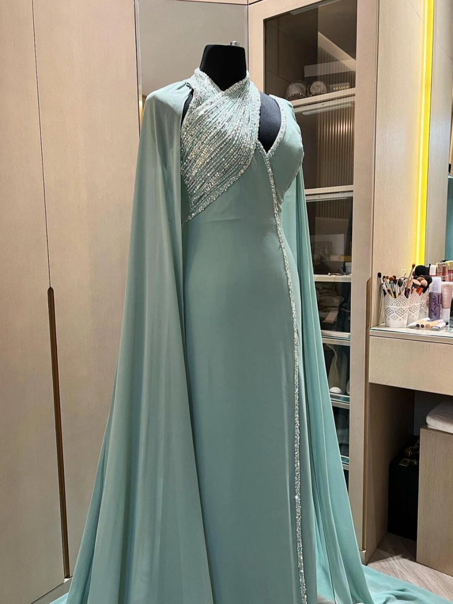 Amani2tw's tweet photo. "Elegance is an attitude, and this dress is the perfect embodiment of it! ✨👗👠 #FashionGoals #Glamour" https://t.co/APcvq2tZYR