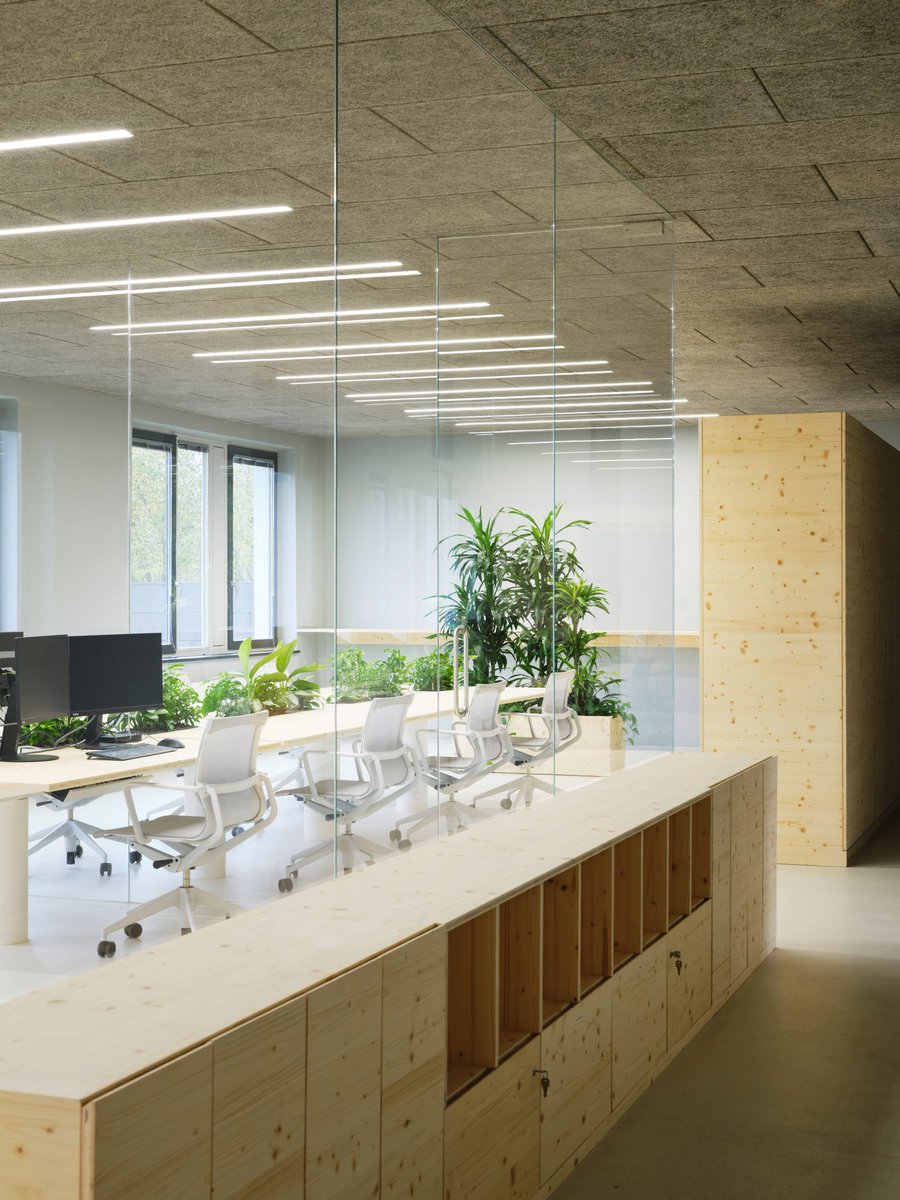 dezeen's tweet image. Zeller & Moye embed plants throughout German office: dezeen.com/2025/07/22/zel…