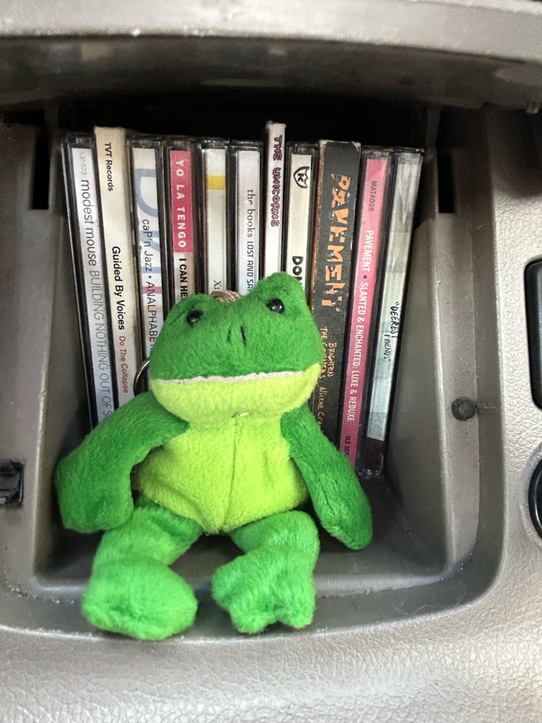 rewhitehaus's tweet image. I have to let you all know right now that i have jim o'rourke halfway to a threeway frog But the mini keychain version and he is my son and i love him very much