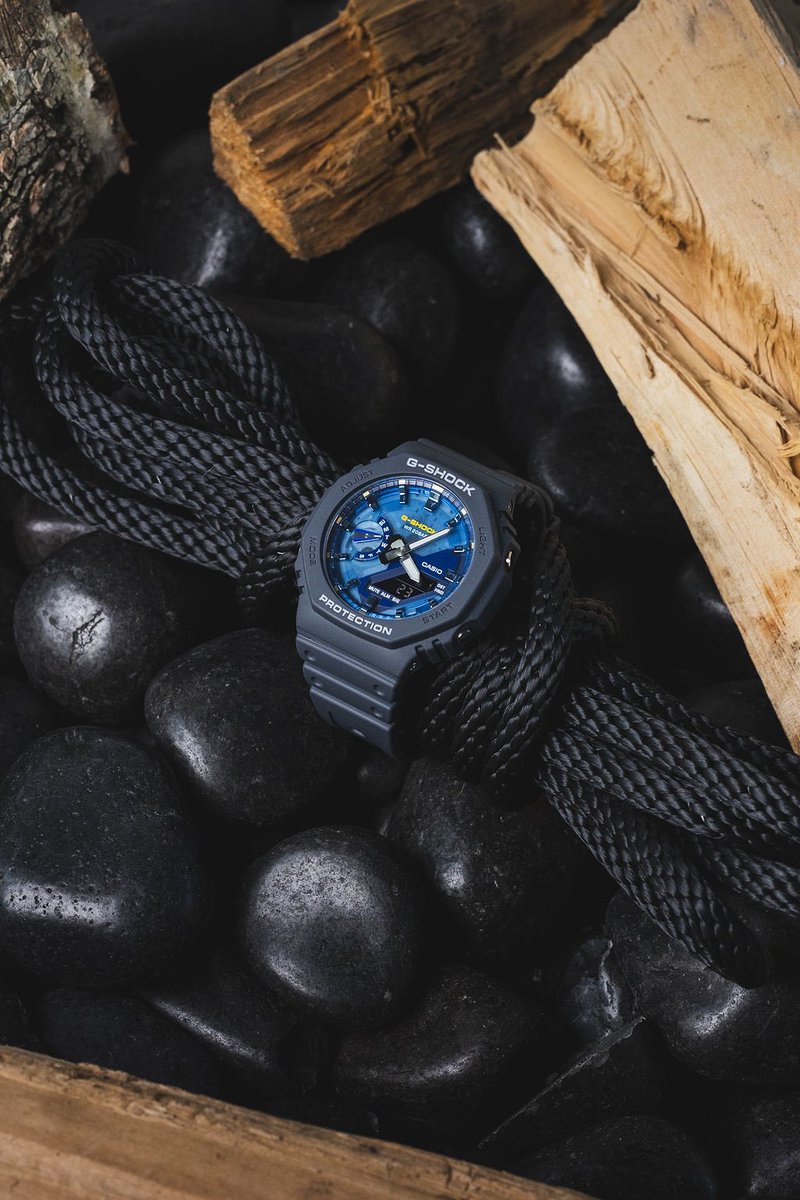 The G-SHOCK GA2100AS-2A features a navy case with blue-green dial accents. Built with Carbon Core Guard, it’s slim, shock resistant, and water resistant up to 200m. Available now!