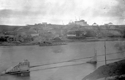 View of construction site for the High-Level Bridge piers. View of construction of the Alberta Legislative Building in background, October 1910 (A2169). searchprovincialarchives.alberta.ca/excavation-for…