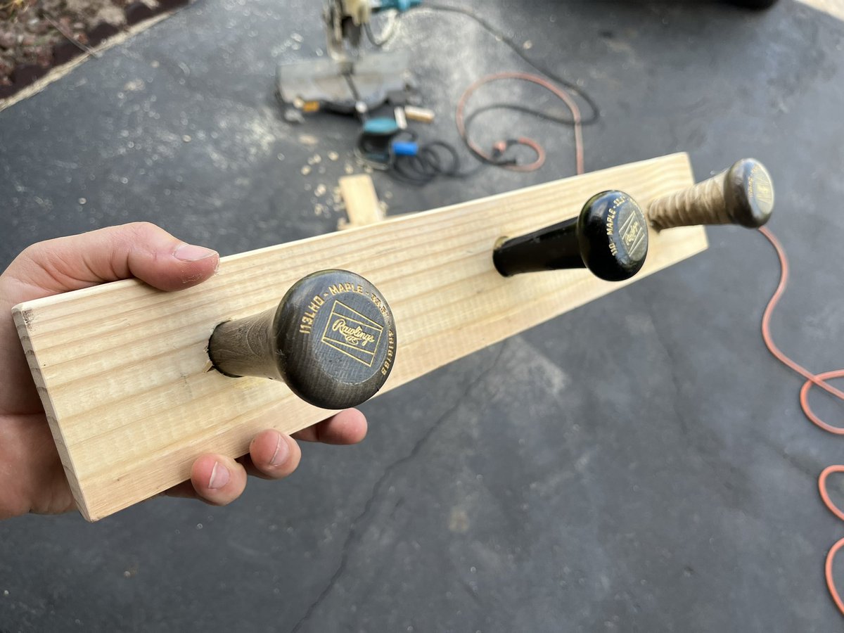 dailystem's tweet image. What do you do when your son works for a baseball team?
You repurpose broken bats into a coat/backpack/hat rack
