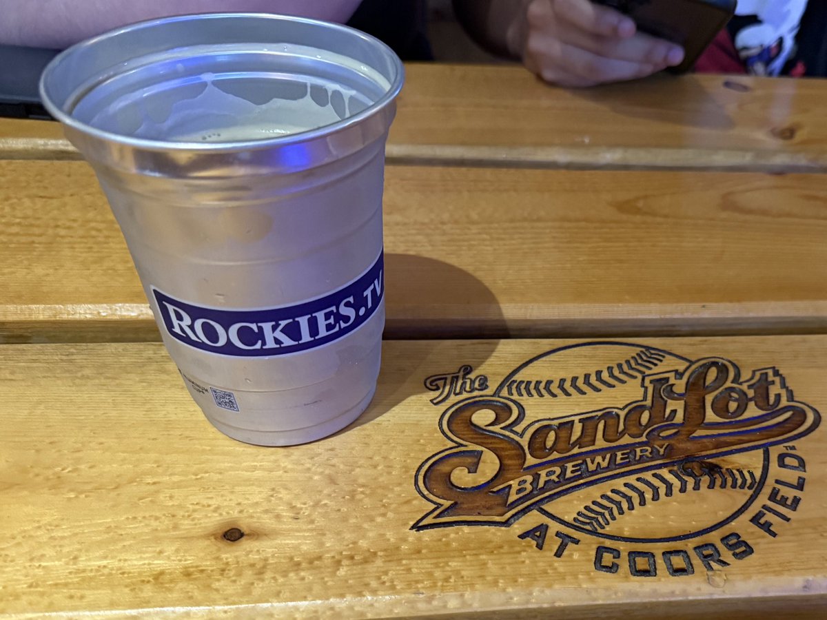 Sitting in the third row of the bleachers at Coors.