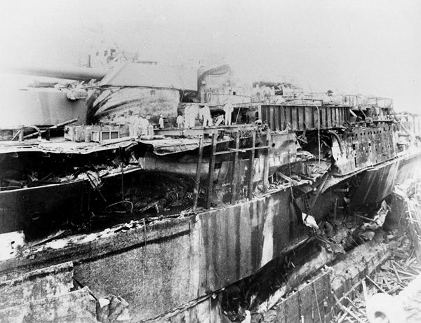 HiddenHistoryYT's tweet image. This picture was taken after the Oklahoma had been recovered from the bottom of Pearl Harbor. You can see how extensive the torpedo damage was to the outer hull