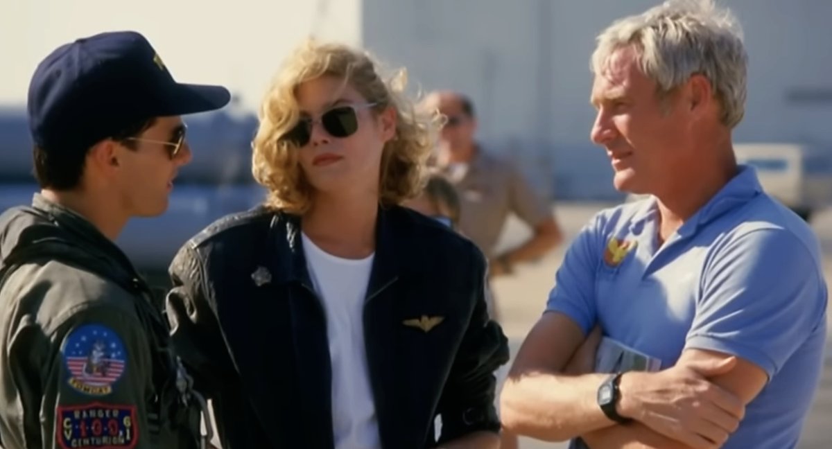 Tom Cruise, Kelly McGillis and Pete Pettigrew on the set of Top Gun