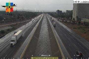 NWSAlbuquerque's tweet image. Heavy rainfall across southeast ABQ towards Canuel is resulting in fast flowing water in the Flood Control Channel between the east and westbound lanes of I-40. Heavy rainfall has also resulted in minor flooding along the side of I-40 at Lomas. #NMwx