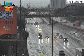 NWSAlbuquerque's tweet image. Heavy rainfall across southeast ABQ towards Canuel is resulting in fast flowing water in the Flood Control Channel between the east and westbound lanes of I-40. Heavy rainfall has also resulted in minor flooding along the side of I-40 at Lomas. #NMwx