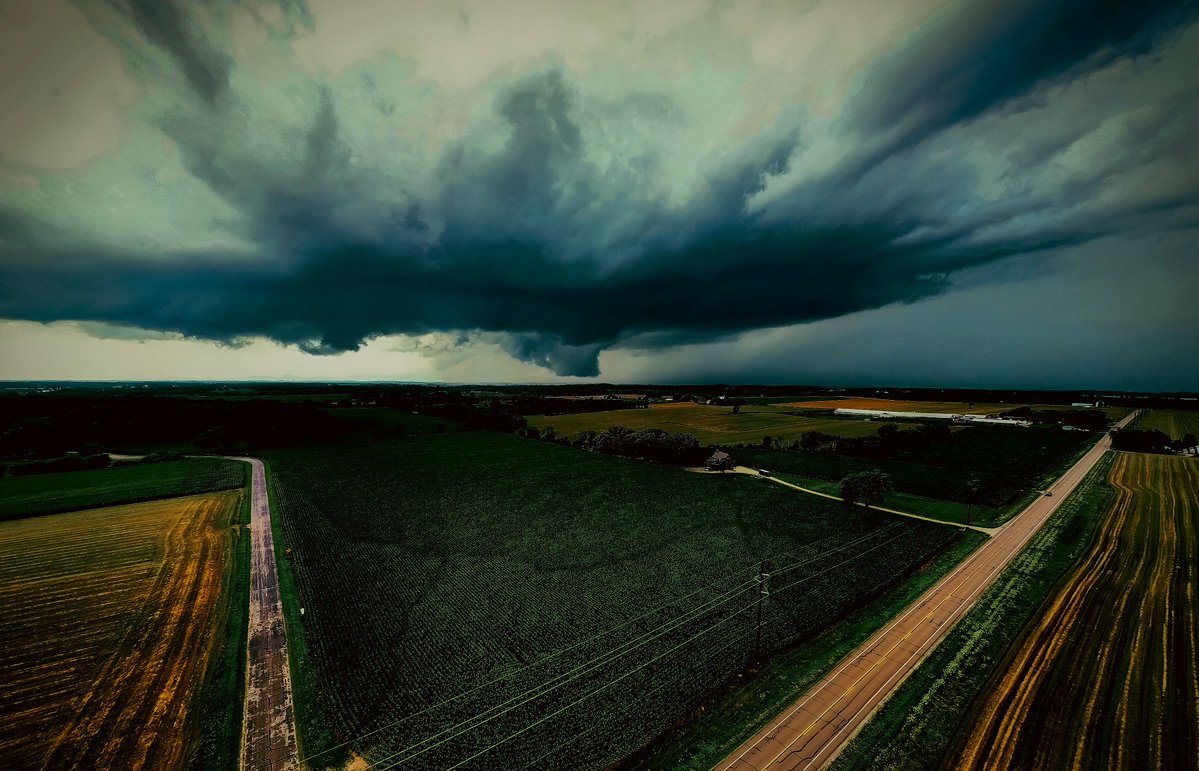 TomPurdyWI's tweet image. A week ago tomorrow a long track supercell spun from near Argyle, Wis to near Iron ridge, Wis.
Here is a cinematic wide angle shot from my drone of the supercell and associated wall cloud near Lake Mills, Wi that afternoon. #wiwx