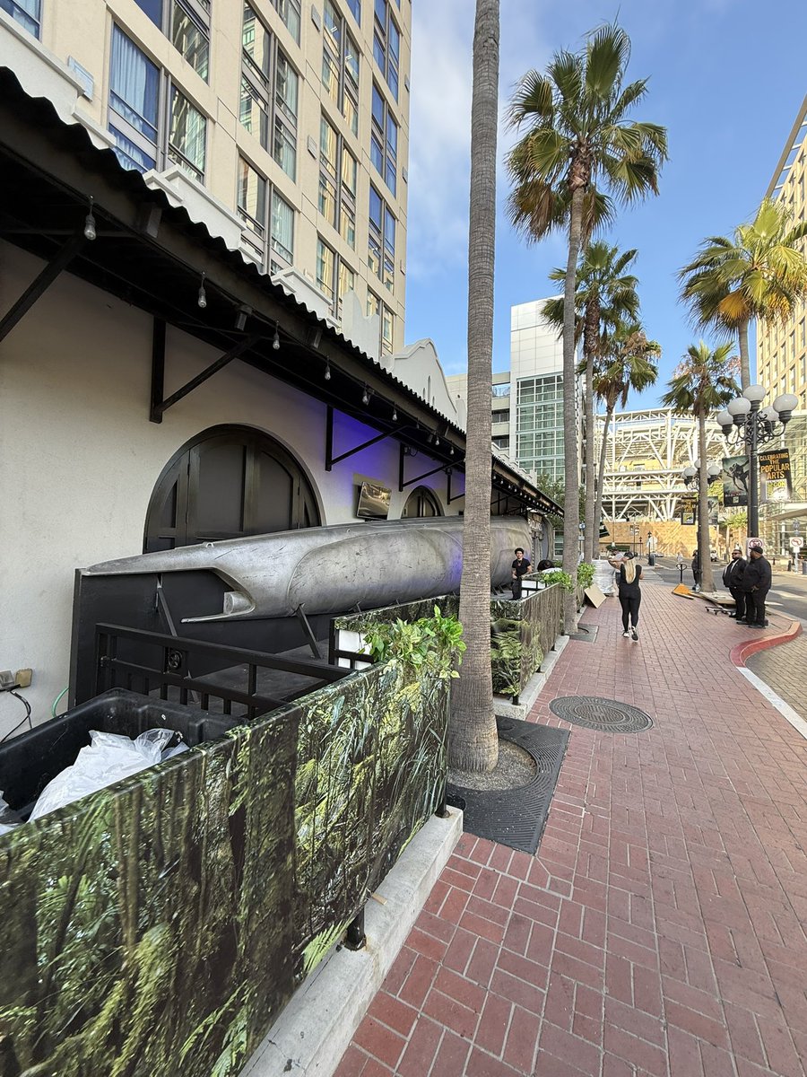 ParksAndCons's tweet image. Out front of #PredatorBadlands is a package that says #TRON. We’re going to see a Predator riding a lightcycle before this weekend ends #SDCC