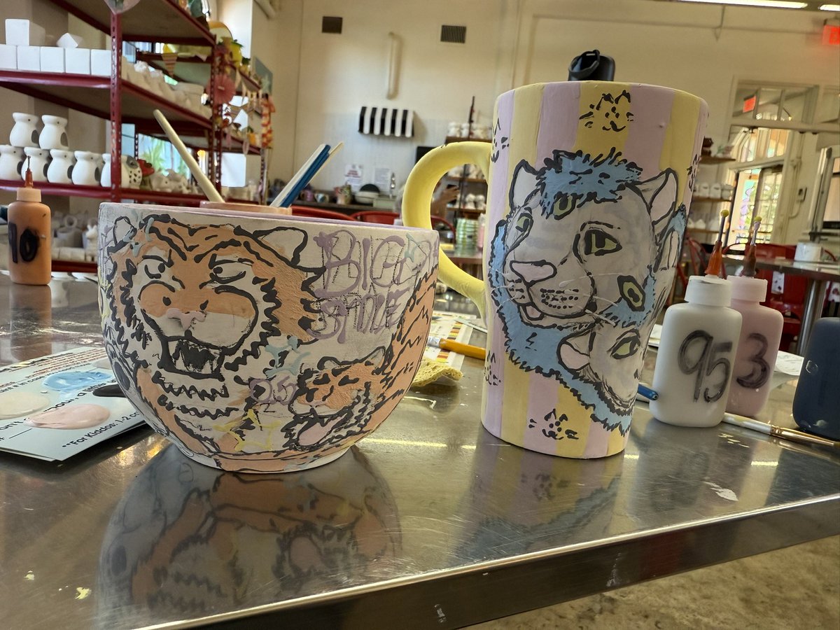 meow_maws's tweet image. Went on a pottery painting date with my partner today :^) the one with the tigers is his!