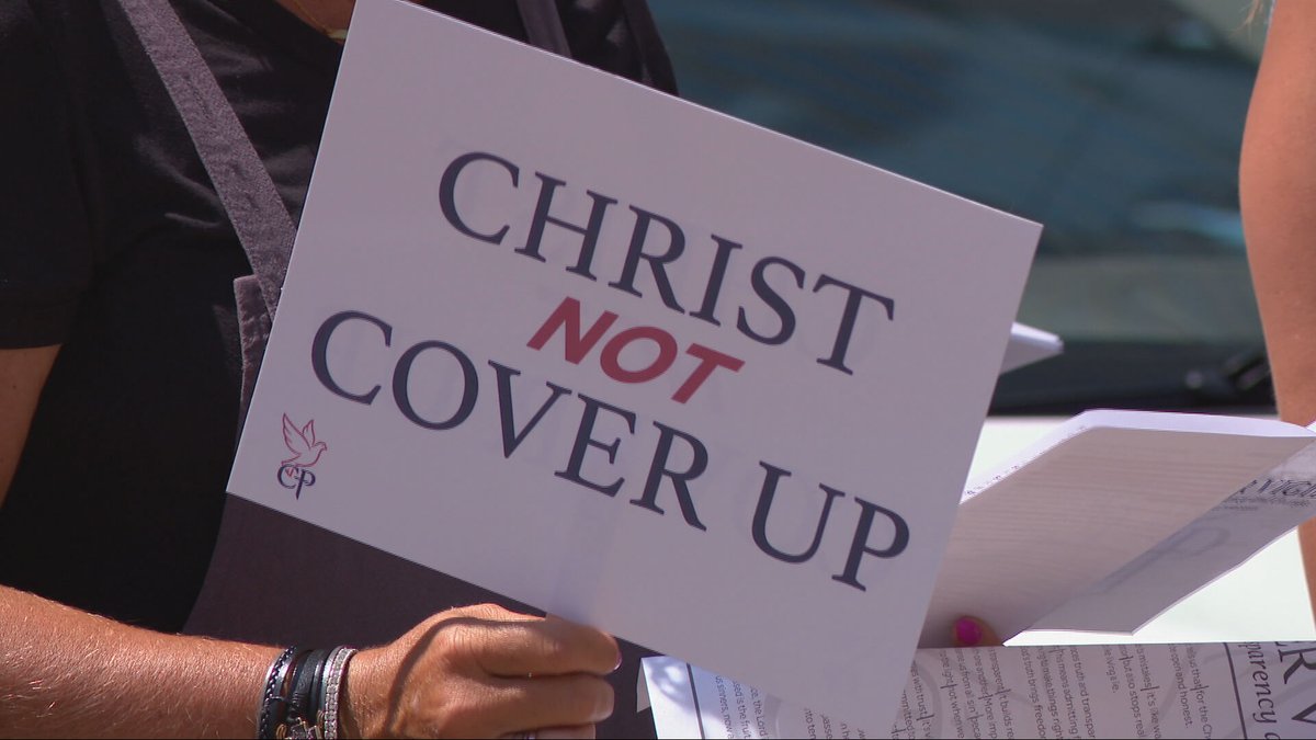 Local12's tweet image. "We are here because we love the church and believe it can do better."
People showed up outside the offices of the Archdiocese of Cincinnati to protest in the form of prayer for transparency.
tinyurl.com/2beeynrn