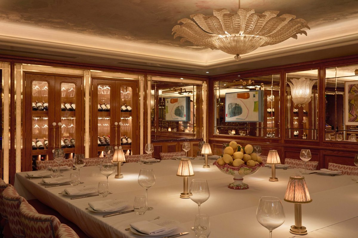 dezeen's tweet image. Venetian sunsets inform warm interiors of London restaurant Cicchetti: dezeen.com/2025/07/20/cic…