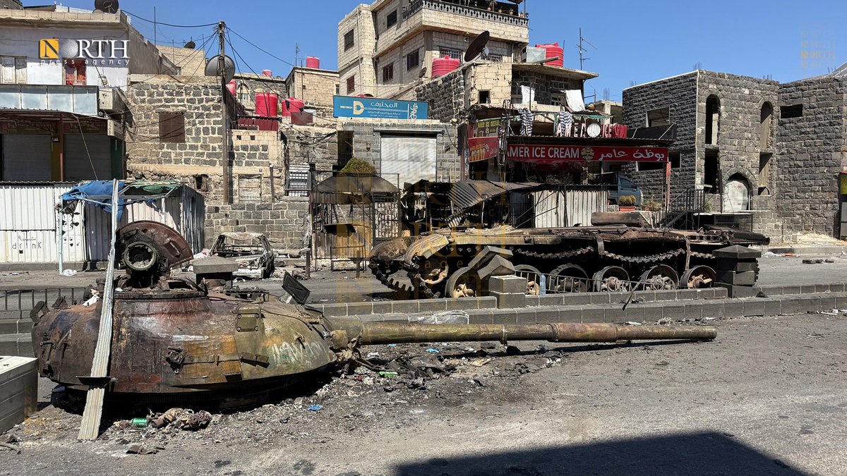 NPA_English's tweet image. Photos show the devastation in the city of Suwayda, southern #Syria following clashes between armed Druze groups and forces of the Syrian transitional government early last week.
#Suwayda - Haroun al-Arbid – North Press