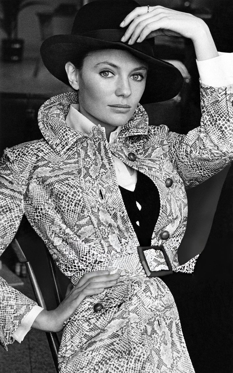 HGACinema's tweet image. Jacqueline Bisset photographed by Bert Stern for Vogue wearing a belted lizard-patterned vinyl raincoat with flapped patch pockets, designed by Arbe for Dorothy Arden; velour fedora by Blades, August 1969.