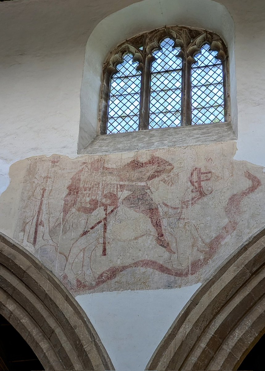 Although the wall paintings at St Mary the Virgin and All Saints, Nassington are somewhat faded they're still interesting.  Dating to the mid 14thC, this is St Martin on an incredibly cheerful horse dividing a very ornately patterned cloak for the beggar.
#WednesdayWallPaintings
