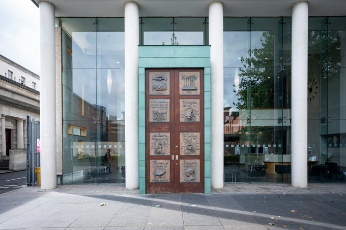 The Bar Library opened its famous doors in 2003. 

The bronze panels by local artist Carolyn Mulholland depict "The Laws of God and Man" and regularly attract lots of attention from visitors to Belfast.