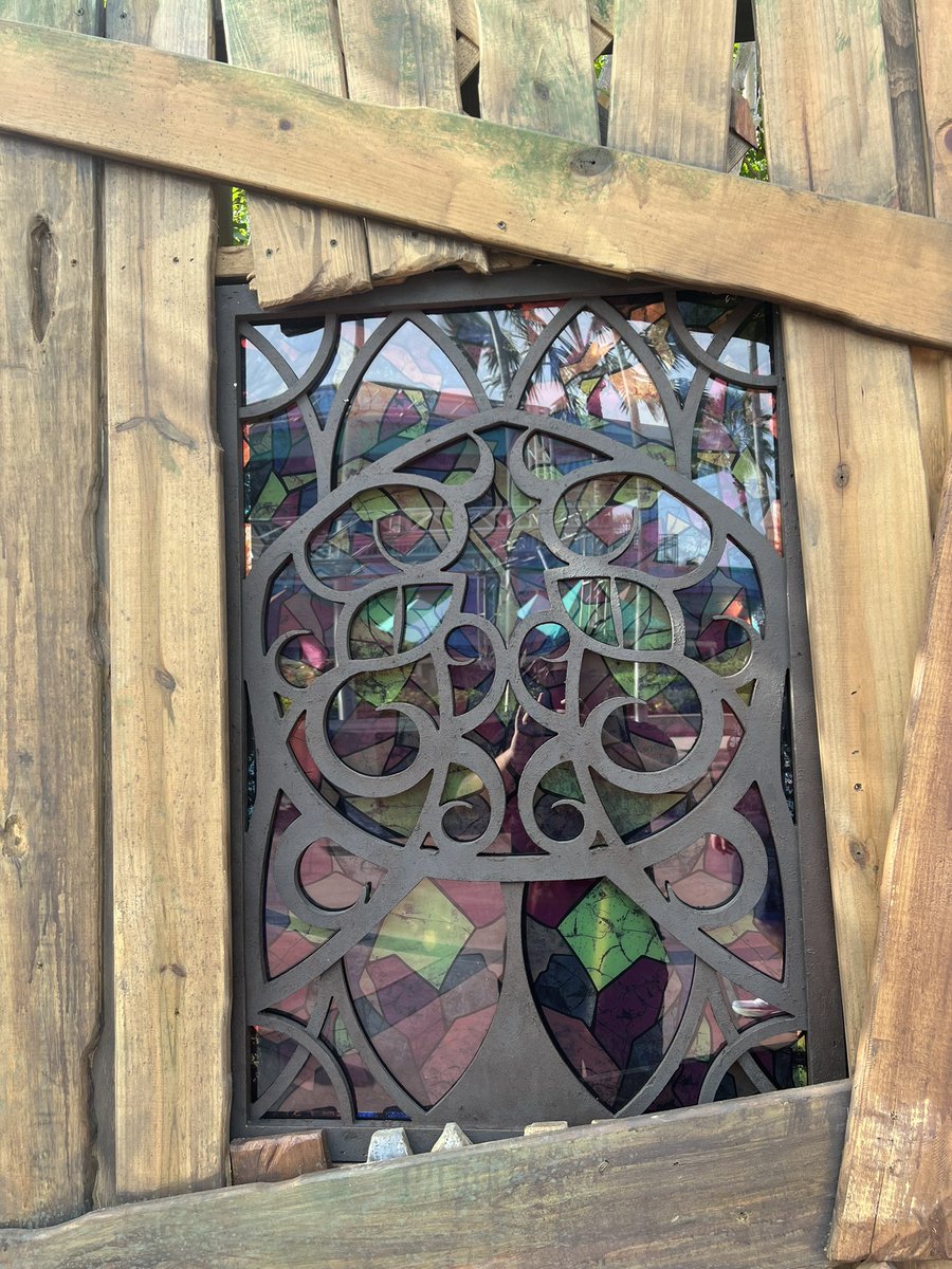 SpeculationMatt's tweet image. The theming from yesterday in Central Park has grown! New details and structures have been added including stained glass! #HHN34 #HHN