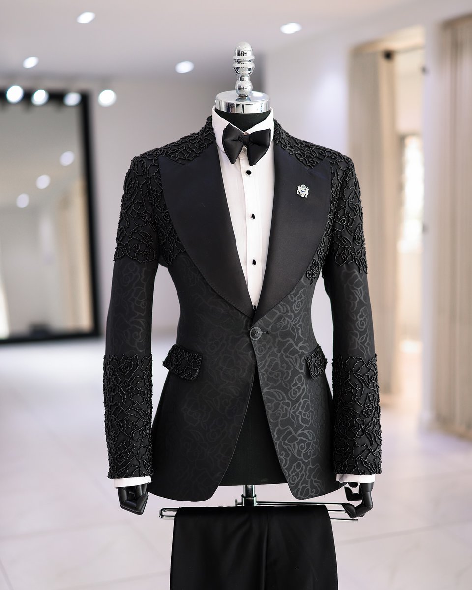 A Charcoal Black, knitted floral jacquard, peak lapel with black silk tuxedo suit, double-breasted waistcoat, layered bow tie &amp; pant trouser