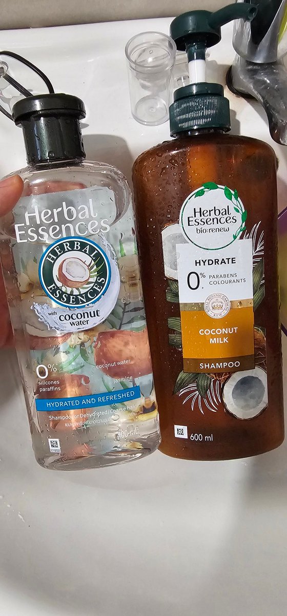 Norazeera_'s tweet photo. Context: Bought coconut water shampoo instead of the coconut milk yang dah habis (see picture).

Haziq: Sayang, you tau tak. Yang ni shampoo. Yang tu shampo.

Me: ... 

Haziq: sebab yang ni water, yang tu ada susu 😋😋😋

He proceeded to giggle to himself for 2 straight minutes. https://t.co/EEAJl1OL5f