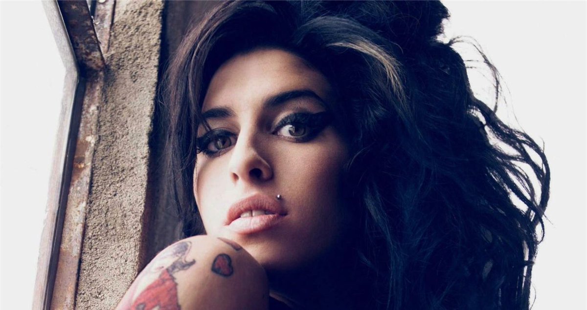 Albumism's tweet image. Remembering Amy Winehouse today on the 14th anniversary of her passing (July 23, 2011) | Explore her musical legacy (including audio & video highlights) here: album.ink/AWinehouseRIP