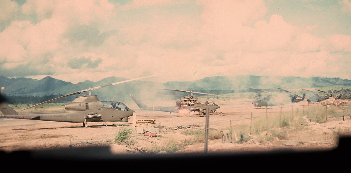 TheReconCast's tweet image. 361st Pink Panther Cobra’s being mortared at DAK TO before the commencement of OP TAILWIND.. Joseph Woody Woodard snapped this photo and if you look close at the fence line you can see one of the pink panthers running for cover after his attempt to get to his bird failed (I’ll…
