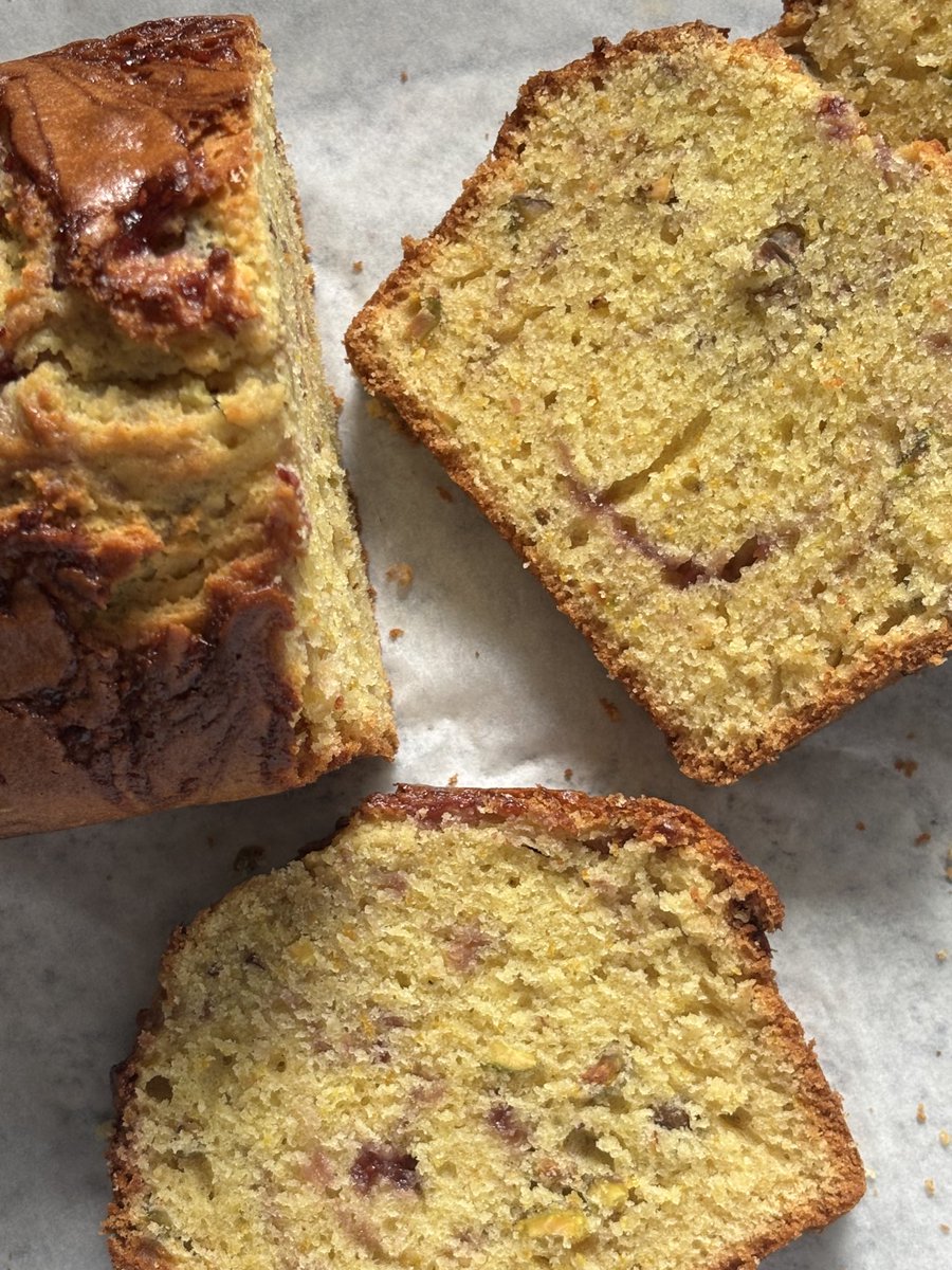 bakingenjoyer's tweet image. orange + pistachio loaf cake, swirled with raspberry jam &lt;3