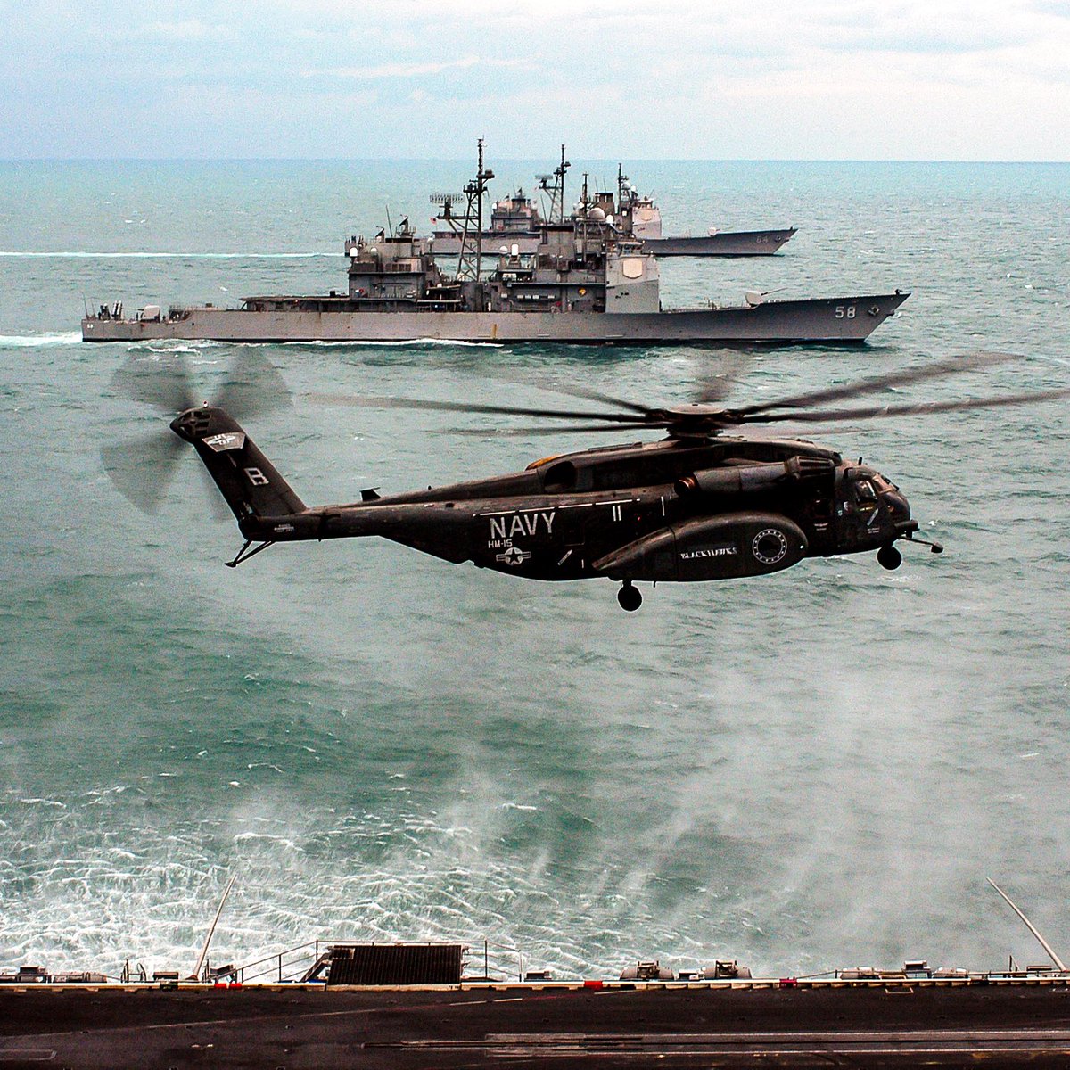 kadonkey's tweet image. A U.S. Navy SEA DRAGON with the Guided Missile Cruisers GETTYSBURG AND PHILIPPINE SEA alongside the USS ENTERPRISE (Rob Gaston)