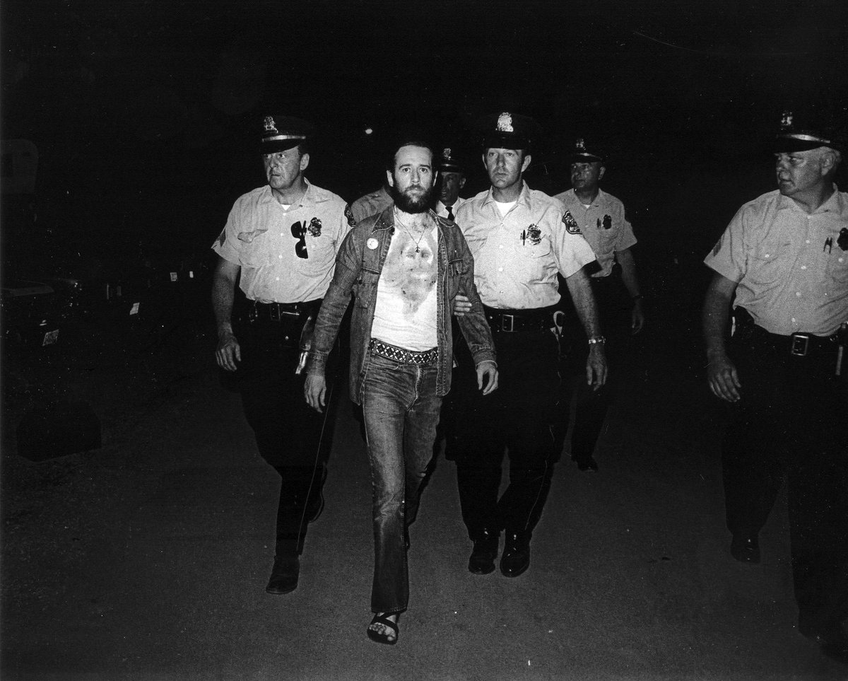 George Carlin being arrested after performing his controversial routine "Seven Words You Can Never Say On Television" May 27, 1972.