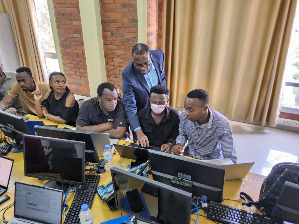 ECEflorida's tweet image. ECE Professor and Associate Chair for Academics Christophe Bobda was pleased to deliver a hands-on seminar while visiting the @Uni_Rwanda. Here, he's sharing his deep knowledge of FPGAs (field-programmable gate arrays) with students.