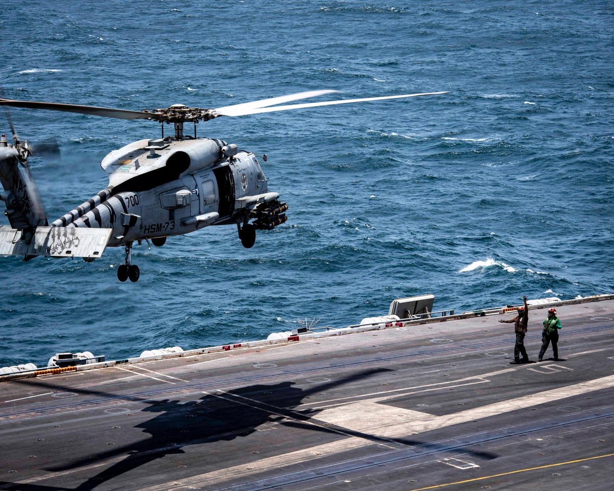 CENTCOM's tweet image. U.S. Sailors aboard the Nimitz-class aircraft carrier USS Nimitz (CVN 68) inspect, prepare, and load ordnance on an MH-60R Sea Hawk in the U.S. Central Command area of responsibility.