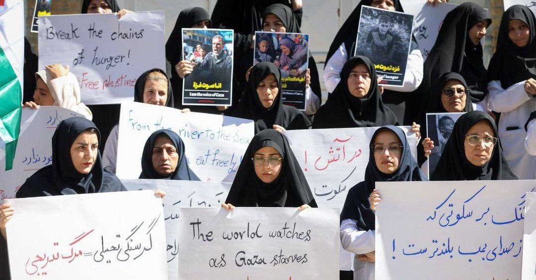 TehranTimes79's tweet image. Healthcare staff from Mashhad University of Medical held a protest outside a hospital, condemning the humanitarian crisis in Gaza.