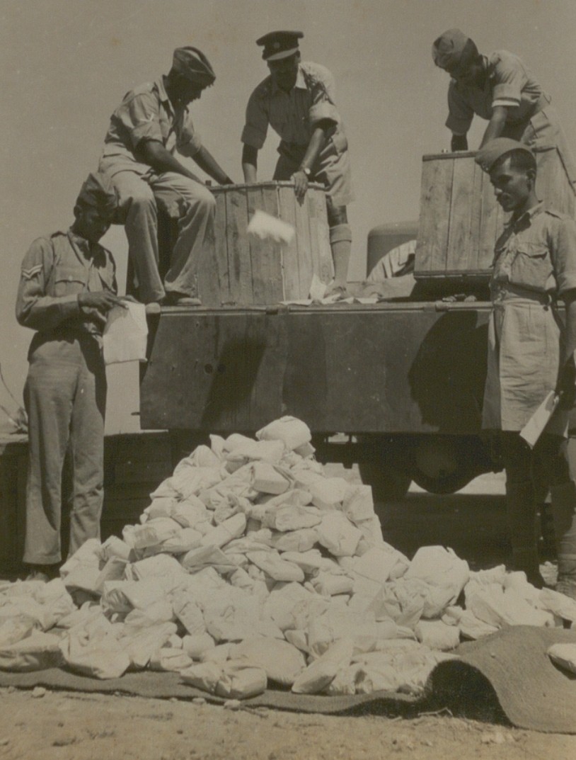 jai_samota's tweet image. Troops of Alwar Jey Paltan unloading postage and parcels in the Middle East sent by their families from India during the Second World War.