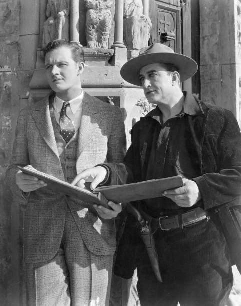 CitizenScreen's tweet image. Francis X. Bushman Jr. and Sr. photographed at Universal in 1927, the first time the two worked at the same studio though on different pictures. Sr. was working on THE GRIP OF THE YUKON, and Jr. on THE SCARLET ARROW 10-episode serial.