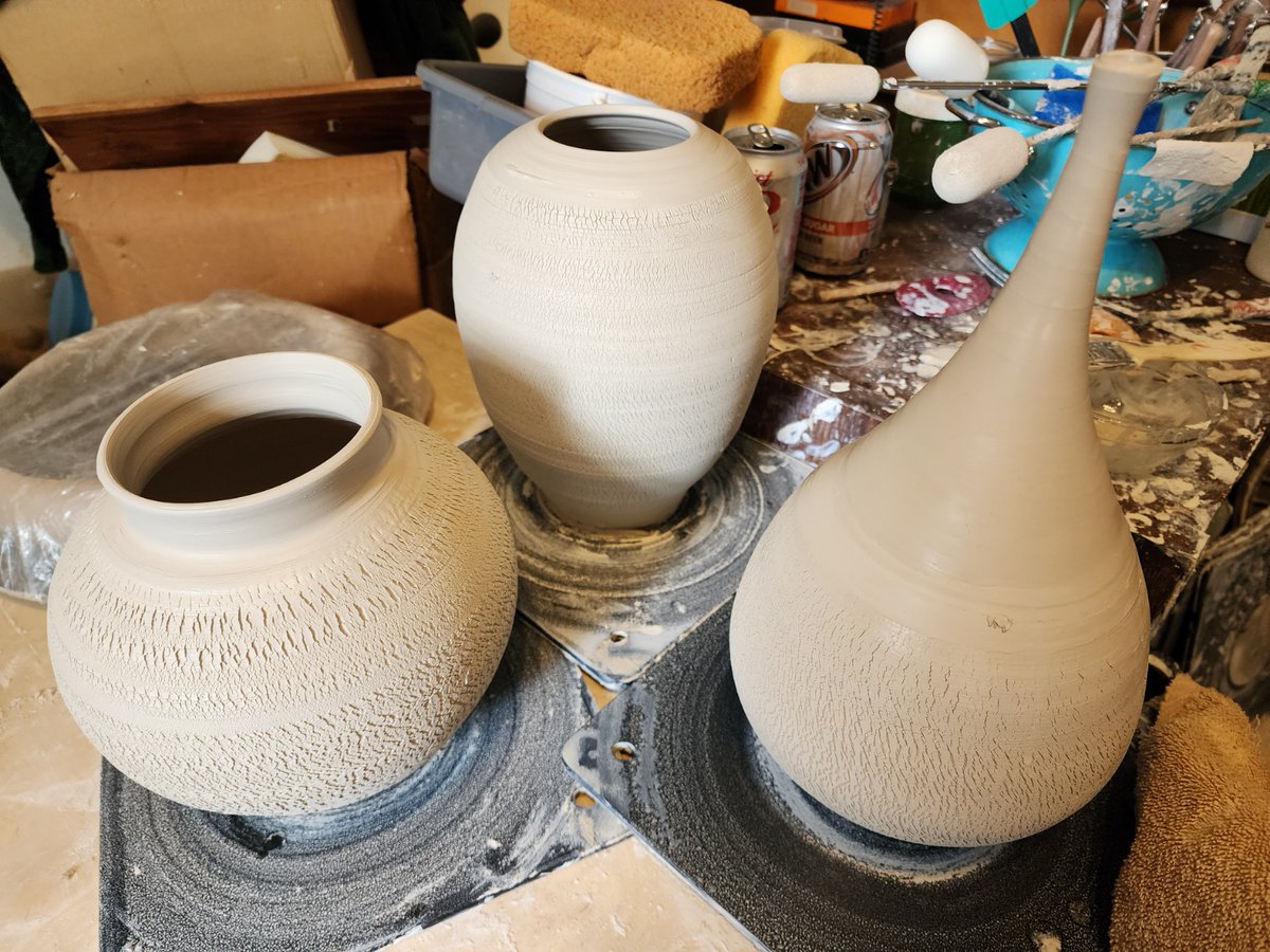 ShadesOfRani's tweet image. Moon Jar, Teardrop Jar and Plum Jar, in porcelain, with crackle texture. Three shapes I have been working on. Pardon the messy studio. it isn't a 'tidy' craft.