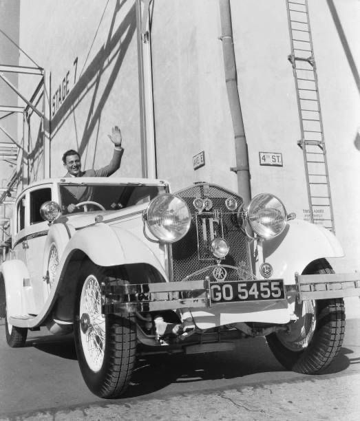 CitizenScreen's tweet image. Carl Brisson in his Isotta Fraschini outside Stage 7 at Paramount Film Studios, circa 1935.